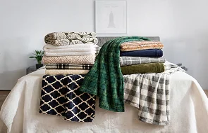 Textured, patterned and plaid blankets for private label collections