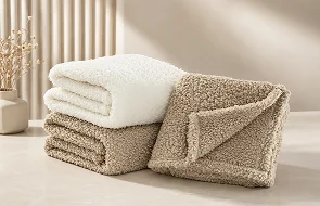 Assorted sherpa, fleece and textured blankets for private label programs